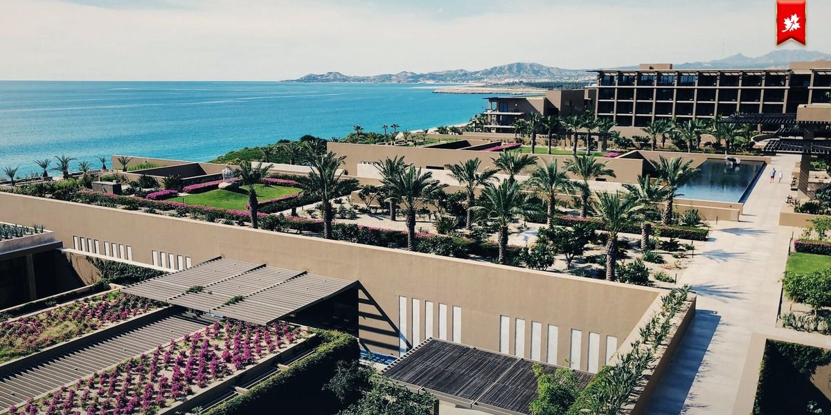 Modern resort gardens and terraces overlooking the sea – airport transfer to Montage