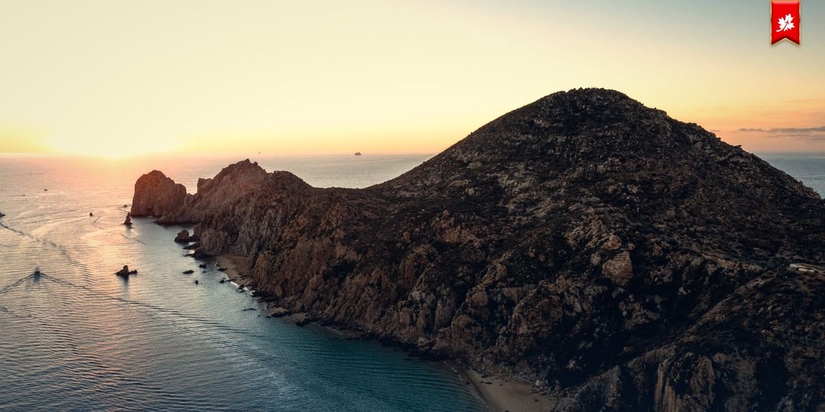 Aerial view of the Land's End headland at sunset – airport transfer to Rancho Pescadero